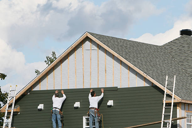 Professional Vinyl Siding technician working in Dola, OH